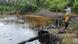 Texaco oil Barrels of in waste pools in Ecuador Texaco oil Barrels of in waste pools in Ecuador