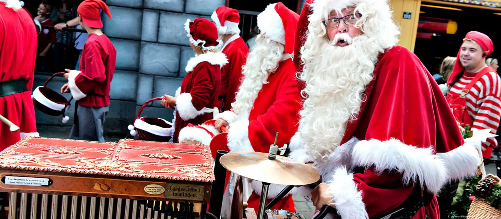 Ho ho ho: Real-life Santas spread Christmas cheer among kids in