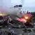 MH17 debris on fire after it was downed