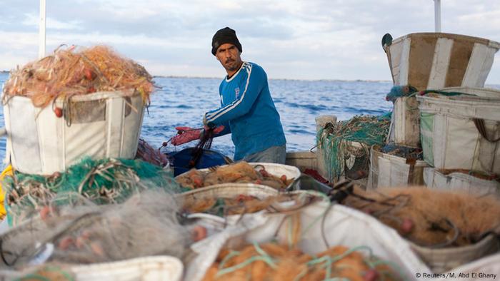A fisherman on a fishing boat A fisherman on a fishing boat