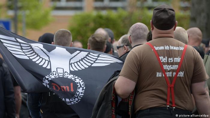 Neo-Nazi group marches with Nazi symbols