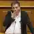 Евклід Цакалотос у ході дебатів у грецькому парламенті