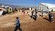 Syrian refugee children walk outside a tent being used as a school at a refugee camp. (Photo: JOSEPH EID/AFP/Getty Images) Syrian refugee children walk outside a tent being used as a school at a refugee camp. (Photo: JOSEPH EID/AFP/Getty Images)