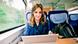 Leonie Müller sitting inside the car of a high-speed train Leonie Müller sitting inside the car of a high-speed train