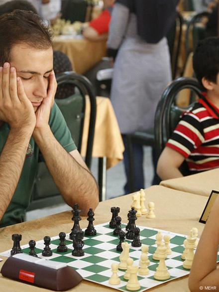 Concentrated serious boy developing chess gambit, strategy ,playing board  game to winner clever concentration and thinking child while playing chess.  Learning, tactics and analysis concept. Free Photo