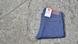 A pair of folded up jeans A pair of folded up jeans