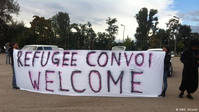 sign welcoming refugees