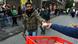 A refugee is handed food after he arrives in Dortmund A refugee is handed food after he arrives in Dortmund