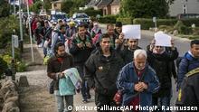 September 7, 2015. Middle Eastern migrants, who came from Germany by ferry and train Sunday night, and are walking from Rodby in southern Denmark towards Sweden on Monday Sept. 7, 2015. Most of the migrants came from Syria, and wished to continue to Sweden where they will seek asylum. The distance from Rodby to the Oresundsbron in Sweden is 180 kilometres. (AP Photo/POLFOTO, Per Rasmussen) DENMARK OUT