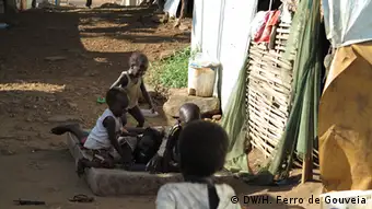 Playing on the streets of Juba: Living quarters for entire families are often no larger than 10 square meters