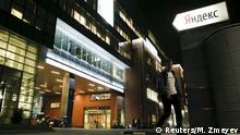 A man walks outside the headquarters of Yandex company in Moscow, September 14, 2015. Russia's anti-monopoly agency said on Monday Google Inc was abusing its dominant market position in the country and could face penalties, in a case launched by its Russian competitor Yandex. The sign (R) reads: Yandex. REUTERS/Maxim Zmeyev