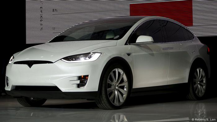 Tesla's first all-electric SUV hits the road | DW Learn German