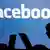 Facebook Datenschutz (Symbolbild) Die Schatten von Jugendlichen mit einem Laptop (Foto: dpa)