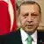 Turkish President Recep Tayyip Erdogan talks to the press
