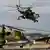 Russian MI-24 combat helicopters landing
