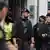 Spanish police stand gaurd after making an arrest.
