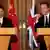 China's President Xi Jinping and Britain's Prime Minister David Cameron attend a joint press conference