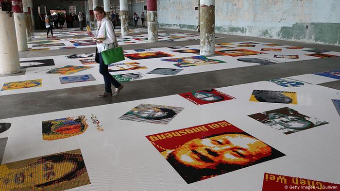 Ai Weiwei exhibition in Alcatraz with lego faces on the floor