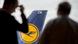 Would-be passengers face a Lufthansa aircraft Would-be passengers face a Lufthansa aircraft