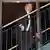 Niersbach nach seinem Rücktritt alleine auf der Treppe. Foto: dpa-pa