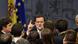 Prime Minister Mariano Rajoy (C) speaks to journalists at the end of a press conference. Prime Minister Mariano Rajoy (C) speaks to journalists at the end of a press conference.