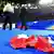 Eine Frankreich-Flagge im Stade de France von Paris am Boden (Foto: picture-alliance/dpa/U. Anspach)