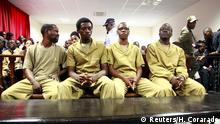 Some of a group of seventeen young Angolan activists appear in court in Luanda, November 16, 2015. The seventeen were charged with rebellion against the state, a case rights groups said showed increasing intolerance of dissent. The young campaigners were detained in June after organizing a reading of U.S. academic Gene Sharp's 1993 book: From Dictatorship to Democracy: A Conceptual Framework for Liberation. REUTERS/Herculano Corarado
