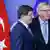 Премьер-министр Турции Ахмет Давутоглу и глава Еврокомиссии Жан-Клод Юнкер на саммите