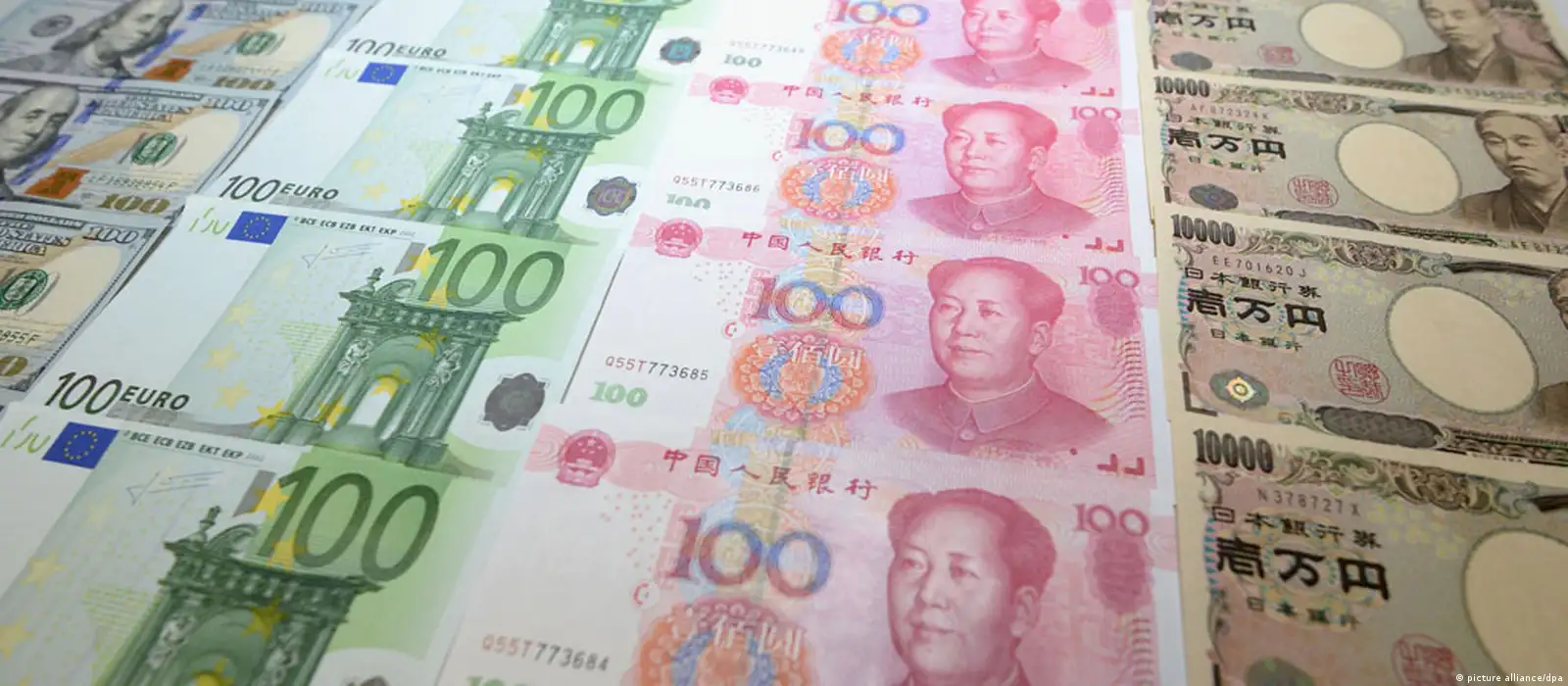China fixes yuan lower