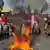 Pakistani religious students burn the Danish flag in Multan in Feb. 2006