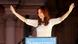 Argentinian President Cristina Fernandez raises her arms to acknowledge a crowd of supporters. Argentinian President Cristina Fernandez raises her arms to acknowledge a crowd of supporters.