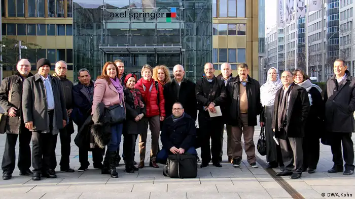 Delegates in front of the Axel Springer publishing building in Berlin (photo: DW Akademie/Alice Kohn).