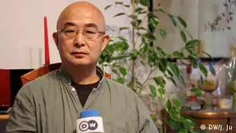 Chinesische Schriftsteller Liao Yiwu - DW-Interview in Köln