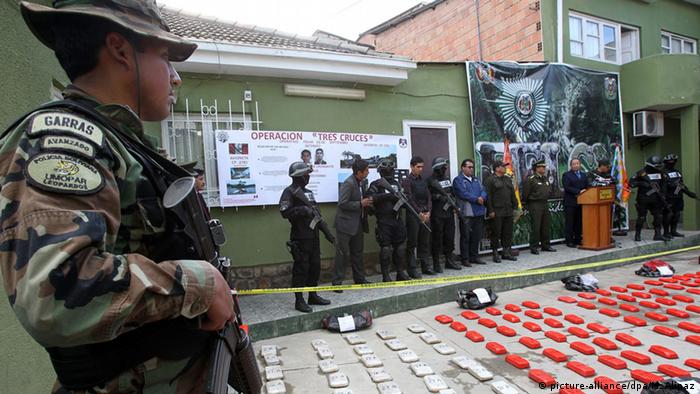 Bolivian Interior Minister Carlos Romero (4-R) is seen during a press presentation to the Bolivian Air Force