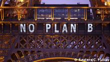 The words No Plan B are illumianted on the Eiffel Tower 