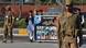 Pakistani students carry a banner bearing images of victims of the Peshawar school massacre as army troops cordon off a street leading to the Army Public School due to hold a ceremony to mark the first anniversary of the school massacre which left more than150 people dead, in Peshawar on December 16, 2015. Pakistan deployed paramilitary forces and police in major cities on December 16 as it marked the first anniversary of a Taliban school massacre that left 151 people dead, shocking a country already scarred by nearly a decade of attacks. Pakistani students carry a banner bearing images of victims of the Peshawar school massacre as army troops cordon off a street leading to the Army Public School due to hold a ceremony to mark the first anniversary of the school massacre which left more than150 people dead, in Peshawar on December 16, 2015. Pakistan deployed paramilitary forces and police in major cities on December 16 as it marked the first anniversary of a Taliban school massacre that left 151 people dead, shocking a country already scarred by nearly a decade of attacks.