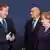 Merkel und Cameron verziehen das Gesicht (Foto: "picture-alliance/dpa/S. Lecocq)