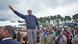 Rwanda's president Paul Kagame waves to crowds Rwanda's president Paul Kagame waves to crowds