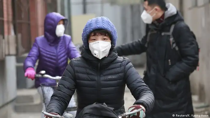 China Familien treffen Vorkehrungen gegen Umweltverschmutzung