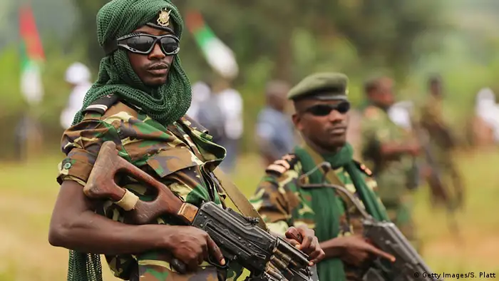 Burundian soldiers holding weapons