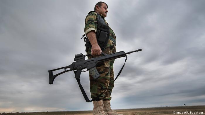 Peshmerga fighter holding a G-36