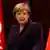 Angela Merkel zwischen zwei Türkei-Flaggen (Foto: rtr)