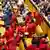 Julius Malema, center, leader of the Economic Freedom Fighters walks out of parliament during President Zuma's speech.