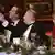 Британский премьер Дэвид Кэмерон, бургомистр Гамбурга Олаф Шольц и канцлер ФРГ Ангела Меркель на праздничном ужине в Гамбургской ратуше