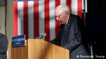 man at podium © Reuters/J. Young