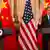 John Kerry and Wang Yi at a joint press conference in Washington