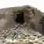 A still from a video shows Islamist militants destroying an ancient shrine in Timbuktu on July 1, 2012. 