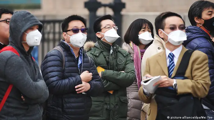 China Peking Journalisten tragen Masken