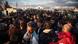 A man tries to hold his place towards the end of the food line amid a sea of people in Idomeni refugee camp A man tries to hold his place towards the end of the food line amid a sea of people in Idomeni refugee camp