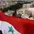 Сирійська прапор над містом Алеппо